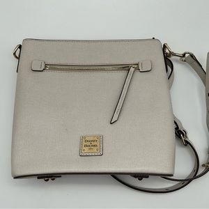 Dooney & Bourke ivory color leather crossbody